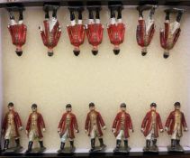 A set of fourteen miniature lead figures.