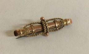 A 9 carat brooch with rope twist decoration.