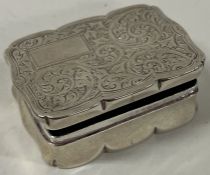 An engine turned silver hinged combination snuff box.