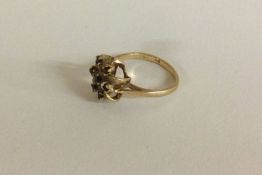 A 9 carat garnet cluster ring.
