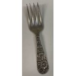 A fine American silver three prong fork. By Kirk & Son.