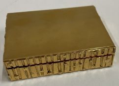 A silver gilt textured snuff box engraved with the words "STEWED RHUBARB". London 1981.