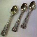 A fine suite of three crested silver egg spoons. George Adams. 1842.
