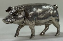 A large silver figure of a pig with lift off lid. Marked on body and part marked to head.