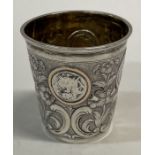 A rare 19th Century silver coin beaker.