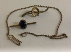 Two gold brooches together with a pendant etc.