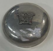 A crested silver box with lift-off lid.