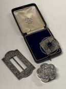 A Continental silver buckle together with a brooch etc.
