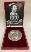 A limited edition cased silver armada dish embossed with an image of King Henry VIII.