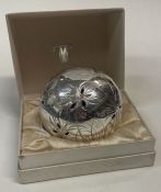 A pierced silver perfume pomander box commemorating the Queen's Jubilee. London 1977.