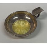 A silver and yellow enamelled wine taster. Birmingham 1913. By GW Lewis & Co.