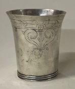 A 17th Century Charles II silver beaker.