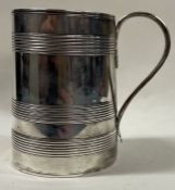 A fine 18th Century George III silver tankard with reeded decoration . London 1790. By Henry Chawner