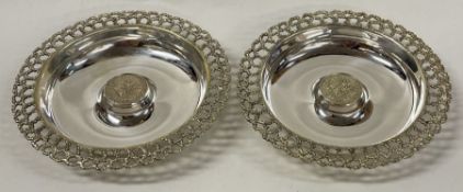 STUART DEVLIN: A pair of silver pierced dishes commemorating the Jubilee.