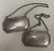 A pair of silver wine labels for 'Whisky' and 'Sherry'.