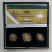 A 2002 United Kingdom gold Proof three-coin sovereign collection.