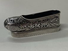 A Chinese silver model of a shoe. Marked to base.