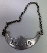 PETER AND JONATHAN BATEMAN: A rare 18th Century silver wine label for 'Brandy'