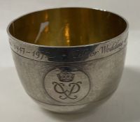 A rare hammered silver tumbler cup commemorating the Silver Wedding of HM the Queen.