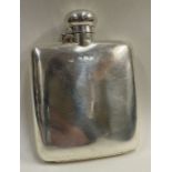 An Art Deco silver hip flask. Birmingham 1906.
