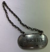 A silver wine label for 'Sherry'. Birmingham.