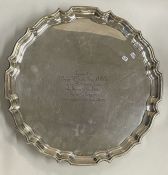A large circular silver salver of typical form. Sheffield. By DS Ltd. Approx.