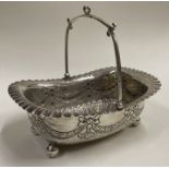 A chased Victorian silver basket embossed with swags. Sheffield 1890. By James Dixon & Sons.