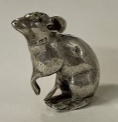 A novelty Victorian silver pepper in the form of mouse. With import marks.