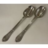 A pair of heavy Victorian silver serving spoons. London 1856. By George Adams.