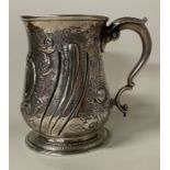 A very heavy 18th Century Georgian chased silver mug. London 1757.