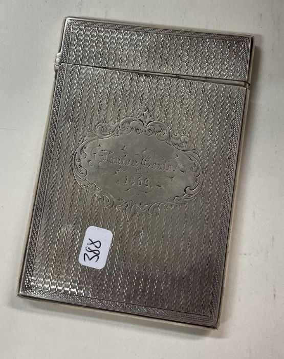 A Victorian engine turned silver card case. London 1868. By Robert Thornton.