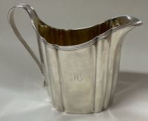 A George III silver reeded jug. London 1803.