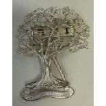 A silver brooch cast in the form of a tree to commemorate the Queens Jubilee 1952 - 1977.