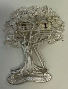 A silver brooch cast in the form of a tree to commemorate the Queens Jubilee 1952 - 1977.