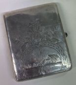 A fine early 20th Century Russian silver cigar case engraved with flowers and a barn scene.