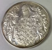 A silver coin commemorating Edward the Black Prince inscribed '1330 - 1378'.