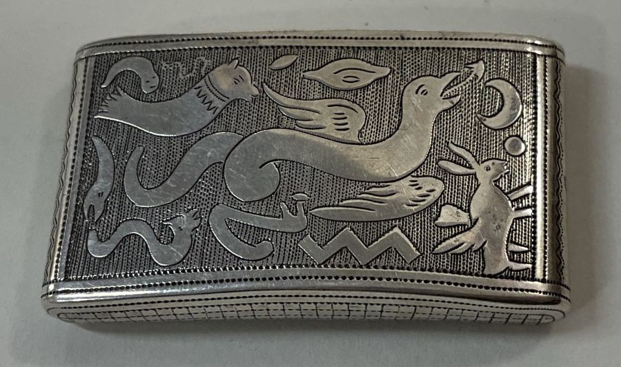 A rare George III silver hinged snuff box engraved with sea creatures. Birmingham 1807.