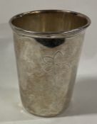 An engraved silver beaker. Marked underneath.