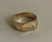 A 9 carat diamond mounted signet ring.