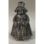 A fine oversized silver figural pepper in the form of a lady. Marked to base. c1900.
