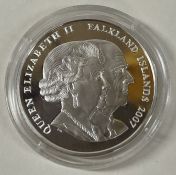 A Falkland Islands silver coin commemorating Queen Elizabeth.