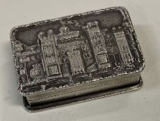 A silver castle top snuff box engraved with Windsor Castle. Birmingham 1977. By SJR.