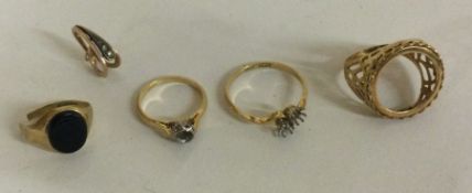 Two 18 carat gold ring mounts.