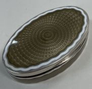 A Continental silver and enamelled hinged snuff box.