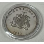 A Barbados Elizabeth and Phillip one dollar silver coin.
