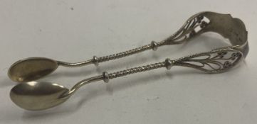 A fine pair of French silver claw ice tongs.