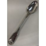 A George III large silver basting spoon. 1820. By William Eley & William Fearn.