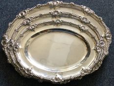 PAUL STORR: A very fine and rare large suite of three George III silver serving dishes.