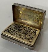 A George III silver vinaigrette with chased border. Birmingham 1830. By John Lawrence.