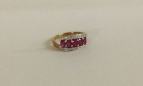 A ruby and diamond three row crossover ring in 9 c